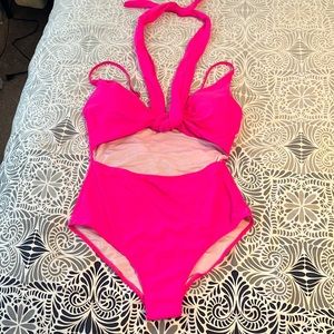 Bright pink one piece with twist tie halter size large new